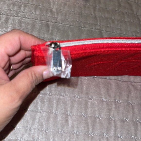 Brand new Christian Dior make up case canvas color is red. - Picture 3 of 9